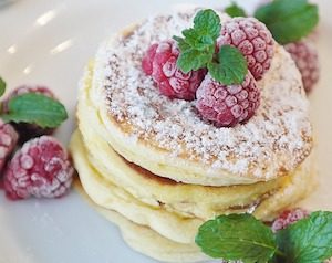 Raspberries compliment pancakes well.